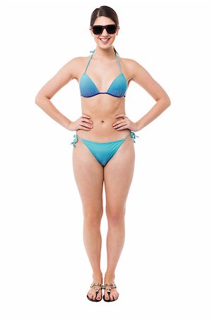 swimsuit model white background - Isolated alluring young bikini woman posing confidently, wearing shades Stock Photo - Budget Royalty-Free & Subscription, Code: 400-08186597