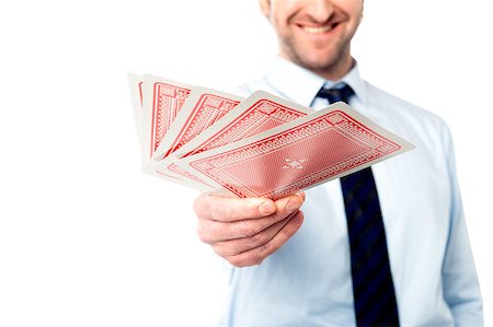 Cropped image of a businessman showing his cards Stock Photo - Budget Royalty-Free & Subscription, Code: 400-08186965