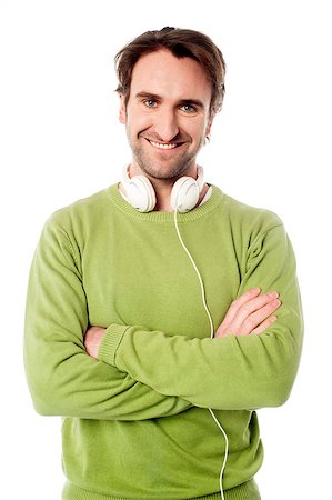 simsearch:693-03707560,k - Confident young man with headphones around his neck Fotografie stock - Microstock e Abbonamento, Codice: 400-08187006