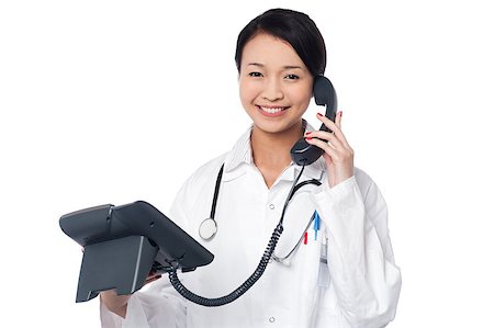 simsearch:400-08131186,k - Female physician attending phone call Foto de stock - Royalty-Free Super Valor e Assinatura, Número: 400-08187110