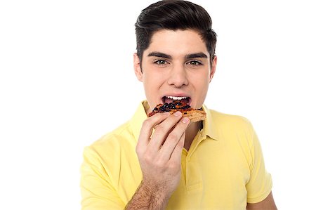 simsearch:400-08042607,k - Handsome guy over white background enjoying pizza slice. Stock Photo - Budget Royalty-Free & Subscription, Code: 400-08187222
