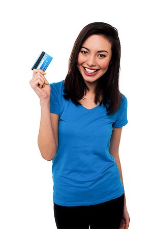 Young pretty smiling asian girl showing her credit card to the camera. Stock Photo - Budget Royalty-Free & Subscription, Code: 400-08187341