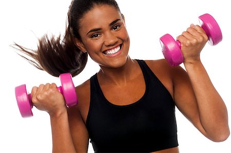 pic of girls with biceps - Cheerful woman building up biceps using dumbbells. Stock Photo - Budget Royalty-Free & Subscription, Code: 400-08187360