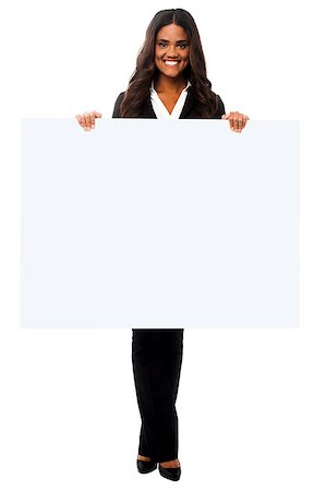 Attractive young woman holding blank banner ad Stock Photo - Budget Royalty-Free & Subscription, Code: 400-08187398