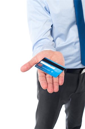 Young corporate man showing his credit card to the camera Stock Photo - Budget Royalty-Free & Subscription, Code: 400-08187463