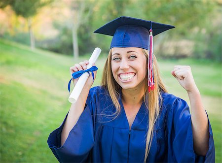 Excited and Expressive Young Woman Holding Diploma in Cap and Gown Outdoors. Stock Photo - Budget Royalty-Free & Subscription, Code: 400-08187606