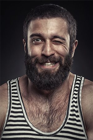 Portrait of a bearded man on dark background Stock Photo - Budget Royalty-Free & Subscription, Code: 400-08187964