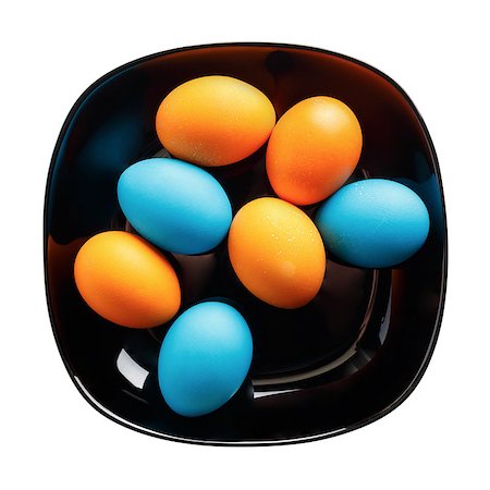 simsearch:400-07921731,k - Colored Easter eggs on a black plate. Isolated with clipping path. Top view. Stock Photo - Budget Royalty-Free & Subscription, Code: 400-08187998