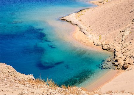 simsearch:400-04243517,k - In the picture a beautiful turquoise lagoon with rocky beaches located in Egypt in the Red Sea Foto de stock - Super Valor sin royalties y Suscripción, Código: 400-08188183