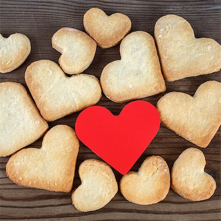 Heart shaped cookies and red heart on wooden background. Top view. Stock Photo - Budget Royalty-Free & Subscription, Code: 400-08188400