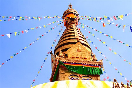 Stupa with Buddha eyes and prayer flags in Swayambhunath, Kathmandu, Nepal Stock Photo - Budget Royalty-Free & Subscription, Code: 400-08188719