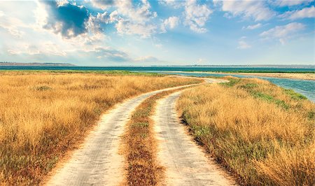 Meandering road to sea Stock Photo - Budget Royalty-Free & Subscription, Code: 400-08197046