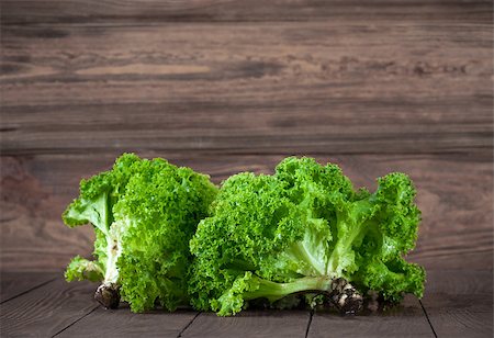 simsearch:400-08375763,k - Fresh leaves lettuce on wooden board Stock Photo - Budget Royalty-Free & Subscription, Code: 400-08197267