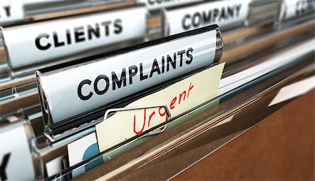 Close up on a file tab with the word complaints, focus on the main text and blur effect. Concept image for illustration of Customer Service complaint management Stock Photo - Budget Royalty-Free & Subscription, Code: 400-08198559