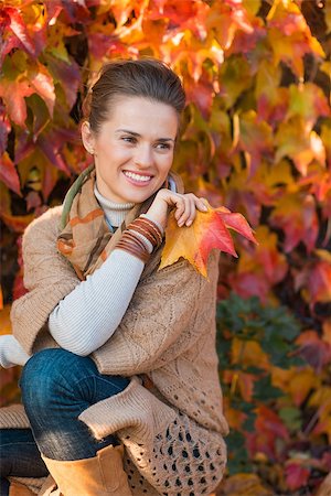 simsearch:400-06520162,k - Portrait of relaxed woman with leafs in front of colorful autumn  foliage Stock Photo - Budget Royalty-Free & Subscription, Code: 400-08198974