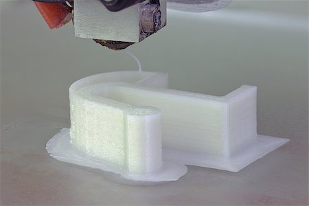 extrudido - 3D Printing the Plastic Wibration Damper Foto de stock - Super Valor sin royalties y Suscripción, Código: 400-08190099