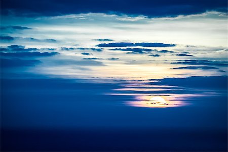 last seconds of a distant sunset over the ocean Stock Photo - Budget Royalty-Free & Subscription, Code: 400-08191338