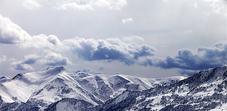simsearch:400-07211845,k - Panoramic view on mountains in evening and cloudy sky. Caucasus Mountains. Georgia, ski resort Gudauri. Stockbilder - Microstock & Abonnement, Bildnummer: 400-08191686