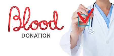 donation - Doctor pointing felt pen against blood donation Stock Photo - Budget Royalty-Free & Subscription, Code: 400-08200416