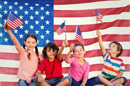 Children with american flags against rippled us flag Stock Photo - Budget Royalty-Free & Subscription, Code: 400-08200428