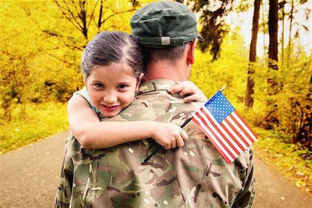 Soldier reunited with his daughter against country road along trees in the lush forest Stock Photo - Budget Royalty-Free & Subscription, Code: 400-08200447