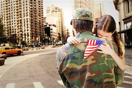 family and army - Father reunited with daughter against new york street Stock Photo - Budget Royalty-Free & Subscription, Code: 400-08200449