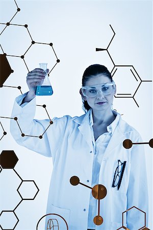 Science graphic against darkhaired woman holding a blue flask Stock Photo - Budget Royalty-Free & Subscription, Code: 400-08200882