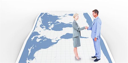 Smiling business people shaking hands against world map Stock Photo - Budget Royalty-Free & Subscription, Code: 400-08224405