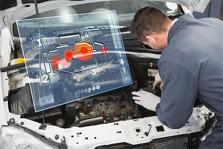 Engine interface against mechanic working under the hood Stock Photo - Budget Royalty-Free & Subscription, Code: 400-08224717