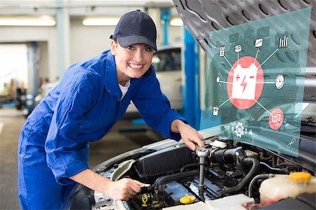 Engineering interface against smiling mechanic working on car Stockbilder - Microstock & Abonnement, Bildnummer: 400-08224726