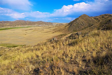 Mountain steppe hills of grassland in Kazakhstan Foto de stock - Royalty-Free Super Valor e Assinatura, Número: 400-08224939