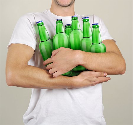 Consumer with a lot of bottles of beer in their hands Stock Photo - Budget Royalty-Free & Subscription, Code: 400-08221377