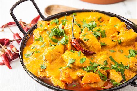 Curried Coconut Chicken with red hot chili pepper and rice Stock Photo - Budget Royalty-Free & Subscription, Code: 400-08222024