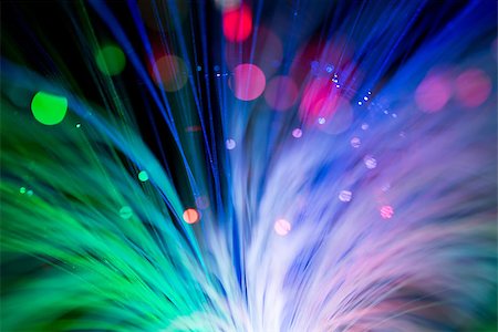 simsearch:400-07995091,k - bunch of optical fibres flying from deep as blurred abstract technology background Stock Photo - Budget Royalty-Free & Subscription, Code: 400-08222318