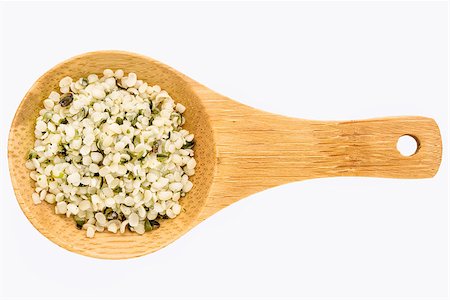 simsearch:400-08222506,k - hemp seed hearts on a small wooden spoon isolated on white with a clipping path Stock Photo - Budget Royalty-Free & Subscription, Code: 400-08222506