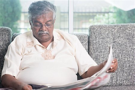 paper moustache - Elder Indian man reading newspaper at home. Asian senior people living lifestyle indoors. Stock Photo - Budget Royalty-Free & Subscription, Code: 400-08223265