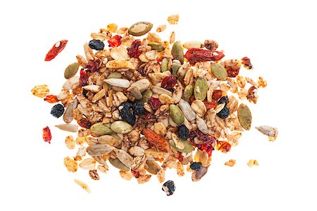 elenathewise (artist) - Pile of homemade granola with various seeds and berries shot from above isolated on white background Photographie de stock - Aubaine LD & Abonnement, Code: 400-08223985