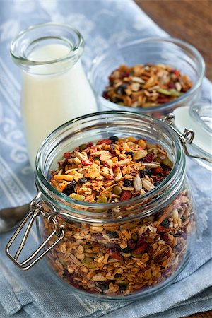 elenathewise (artist) - Homemade granola in open glass jar and milk or yogurt  on table with linens Photographie de stock - Aubaine LD & Abonnement, Code: 400-08223987