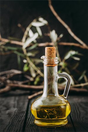 simsearch:400-05666507,k - Extra virgin healthy Olive oil with fresh olives on dark wooden background Stock Photo - Budget Royalty-Free & Subscription, Code: 400-08254080