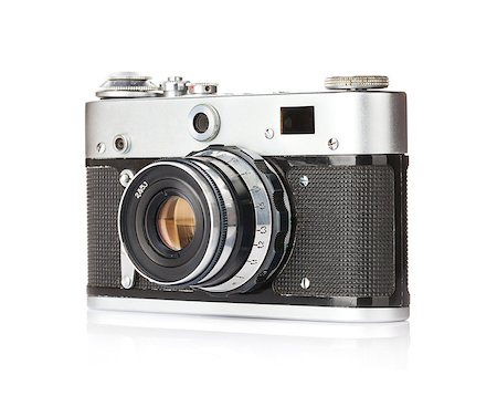 simsearch:400-06630396,k - Vintage film camera. Isolated on white background Foto de stock - Super Valor sin royalties y Suscripción, Código: 400-08254377