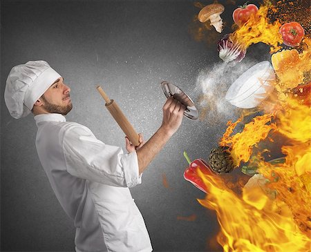 fight fires - Cook is repaired by flames and food Stock Photo - Budget Royalty-Free & Subscription, Code: 400-08254392