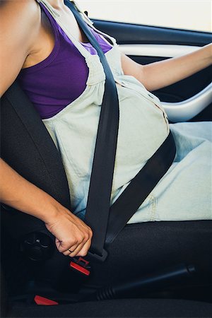 simsearch:400-05915243,k - Pregnant woman wear safety belt in the car Foto de stock - Super Valor sin royalties y Suscripción, Código: 400-08254404
