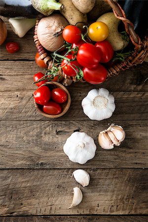 Vegetables on wood. Bio Healthy food, herbs and spices. Organic vegetables on wood Stock Photo - Budget Royalty-Free & Subscription, Code: 400-08254566