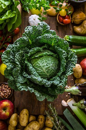 Vegetables on wood. Bio Healthy food, herbs and spices. Organic vegetables on wood Stock Photo - Budget Royalty-Free & Subscription, Code: 400-08254563