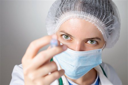 Closeup of a female doctor with syringe Stock Photo - Budget Royalty-Free & Subscription, Code: 400-08254599