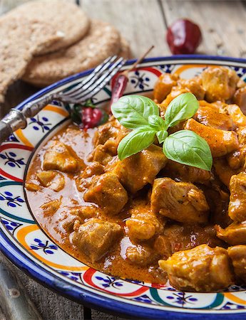 Chicken curry tikka masala with basmati rice on decorated bowl Stock Photo - Budget Royalty-Free & Subscription, Code: 400-08254619