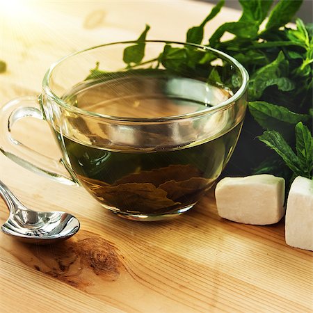 simsearch:400-06554630,k - cups of tea with mint on wooden table Stock Photo - Budget Royalty-Free & Subscription, Code: 400-08254627