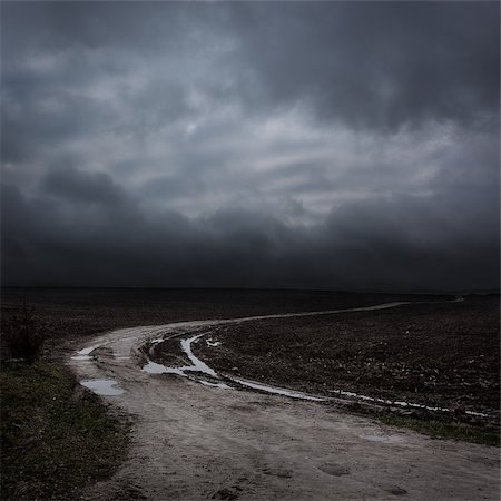 Night Landscape with Country Road and Dark Clouds. Moody Sky Background. Fotografie stock - Microstock e Abbonamento, Codice: 400-08254681