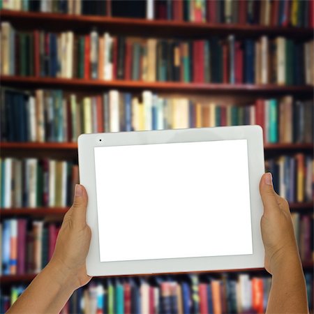 simsearch:400-04856402,k - Hands holding empty tablet with library shelfs in background Stock Photo - Budget Royalty-Free & Subscription, Code: 400-08254945