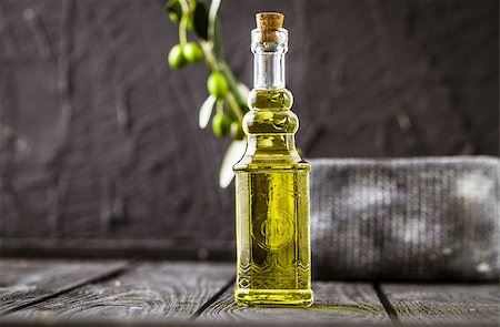 simsearch:400-05666507,k - Extra virgin healthy Olive oil with fresh olives on dark wooden background Stock Photo - Budget Royalty-Free & Subscription, Code: 400-08255017